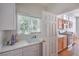Bright kitchen features ample counter space, modern appliances, and a window for natural light at 2413 Rockford St, Las Vegas, NV 89134