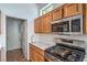 Efficient kitchen showcasing modern appliances, countertop space, and seamless access to adjacent areas at 2413 Rockford St, Las Vegas, NV 89134