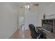 Bright bedroom features vaulted ceilings with ceiling fan and hardwood floors at 2528 Huber Heights Dr, Las Vegas, NV 89128