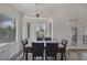 Dining area featuring a large bay window and adjacent access to the backyard at 2528 Huber Heights Dr, Las Vegas, NV 89128