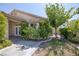 Charming home featuring well-maintained landscaping and a welcoming entrance at 2528 Huber Heights Dr, Las Vegas, NV 89128