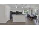 Bright eat in kitchen with a breakfast bar and dark countertops at 2528 Huber Heights Dr, Las Vegas, NV 89128