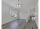 Open-concept room with vaulted ceilings and hardwood floors at 2528 Huber Heights Dr, Las Vegas, NV 89128