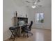 Home office space with window providing lots of natural light and a ceiling fan above at 2528 Huber Heights Dr, Las Vegas, NV 89128