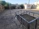 Backyard featuring a partial enclosure and a storage shed in the rear at 2645 Cedar Ave, Las Vegas, NV 89101