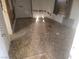 Interior shot of a bedroom, showing the floor and wall damage at 2645 Cedar Ave, Las Vegas, NV 89101