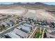 Stunning aerial view of a modern community, highlighting well-manicured lawns and contemporary home designs at 2722 Marchetti Pl, Henderson, NV 89044