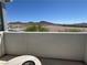 Intimate balcony featuring a cozy fire pit and a stunning view of the landscape at 2722 Marchetti Pl, Henderson, NV 89044