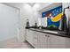 Charming bathroom with double vanity, modern fixtures, and unique mermaid-themed mural at 2722 Marchetti Pl, Henderson, NV 89044