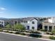 Modern two-story home with well-maintained landscaping, showcasing its contemporary design and curb appeal at 2722 Marchetti Pl, Henderson, NV 89044