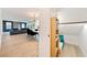 Spacious living area with modern decor, dining space, and hidden storage at 2722 Marchetti Pl, Henderson, NV 89044