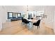 Bright, open living space featuring modern decor, a dining area, and kitchen at 2722 Marchetti Pl, Henderson, NV 89044
