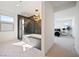 Luxurious bathroom showcasing a modern bathtub, separate shower, and stylish fixtures at 2722 Marchetti Pl, Henderson, NV 89044