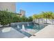 A luxurious pool with water features and lush landscaping provides a serene outdoor retreat at 2722 Marchetti Pl, Henderson, NV 89044