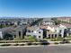 A view of a street with modern homes in a planned community at 2722 Marchetti Pl, Henderson, NV 89044