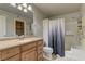 Bathroom featuring a roll-in shower, modern vanity, and neutral color palette at 278 Star Cluster Cir, Las Vegas, NV 89145