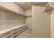 Well-organized walk-in closet with built-in shelving and ample storage space at 278 Star Cluster Cir, Las Vegas, NV 89145