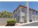 Charming two-story townhome featuring classic stucco and a terra cotta roofline in a quiet neighborhood at 278 Star Cluster Cir, Las Vegas, NV 89145
