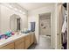Bright bathroom features a large vanity, updated fixtures, and a walk-in shower at 2851 S Valley View Blvd # 1071, Las Vegas, NV 89102