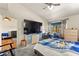 Bedroom features a ceiling fan and a window overlooking the exterior at 2851 S Valley View Blvd # 1071, Las Vegas, NV 89102