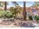 Charming condo exterior with a well-manicured lawn and mature trees offering shade at 2851 S Valley View Blvd # 1071, Las Vegas, NV 89102