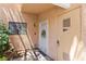 Welcoming front entrance with stylish white door with a wreath and security features at 2851 S Valley View Blvd # 1071, Las Vegas, NV 89102