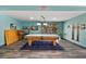 Game room with pool table, accent rug and painted in tranquil aquamarine at 2851 S Valley View Blvd # 1071, Las Vegas, NV 89102