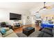 Large open concept living room with a ceiling fan and ample seating areas at 2851 S Valley View Blvd # 1071, Las Vegas, NV 89102