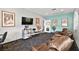 Relaxing lounge area with comfortable seating, TV, and stylish decor at 2851 S Valley View Blvd # 1071, Las Vegas, NV 89102