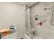 Bright shower features marble tile, grab bars, and a convenient toiletry nook at 2851 S Valley View Blvd # 1071, Las Vegas, NV 89102