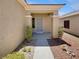 Inviting front entrance with a covered porch and well maintained landscaping at 3053 Monroe Park Rd, Henderson, NV 89052