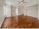 Large living room featuring hardwood floors, a ceiling fan, and ample space at 3053 Monroe Park Rd, Henderson, NV 89052
