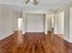 A spacious living room with hardwood floors and neutral walls at 3053 Monroe Park Rd, Henderson, NV 89052
