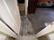 Bedroom showing underlayment along the wall from apparent water damage at 3447 One Nation Ave, Las Vegas, NV 89121