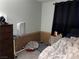 Comfortable bedroom space with a pet area, and modern amenities at 3447 One Nation Ave, Las Vegas, NV 89121