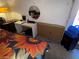 Bedroom with desk area that has a round mirror and a nearby humidifier at 3447 One Nation Ave, Las Vegas, NV 89121