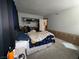 Bedroom featuring comfortable bed and open closet, ready for personal touches at 3447 One Nation Ave, Las Vegas, NV 89121