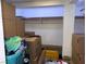 Storage closet featuring shelving filled with personal items and storage boxes at 3447 One Nation Ave, Las Vegas, NV 89121