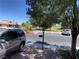 Picturesque community park offering ample parking, mature trees, lush greenery, and a serene environment at 3447 One Nation Ave, Las Vegas, NV 89121