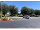 Community park offers lush green space, mature trees, playground equipment, and parking for residents at 3447 One Nation Ave, Las Vegas, NV 89121