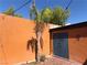 Private courtyard with terracotta tile, accent wall, and decorative lighting, perfect for outdoor living at 3447 One Nation Ave, Las Vegas, NV 89121