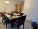 Formal dining room showcasing a large table and chandelier, ideal for gatherings at 3447 One Nation Ave, Las Vegas, NV 89121