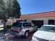 Exterior of the home showing two-car garage, tile roof, and vehicles parked in front at 3447 One Nation Ave, Las Vegas, NV 89121