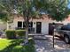 Charming home exterior with well-maintained landscaping, a brick pathway, and ample parking space at 3447 One Nation Ave, Las Vegas, NV 89121