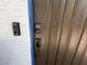 Close-up of the front door with a Ring doorbell and key pad entry at 3447 One Nation Ave, Las Vegas, NV 89121