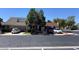 Charming home exterior with a well-maintained yard and cars parked in the driveway at 3447 One Nation Ave, Las Vegas, NV 89121
