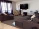 Spacious living room with comfortable seating, perfect for relaxing and entertaining at 3447 One Nation Ave, Las Vegas, NV 89121