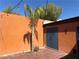 Outdoor patio featuring a palm tree, storage shed, and tiled flooring at 3447 One Nation Ave, Las Vegas, NV 89121