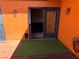 Exterior patio door with a turf mat at 3447 One Nation Ave, Las Vegas, NV 89121