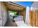 Hot tub on covered patio, creating a serene and secluded backyard retreat at 3557 Wayne Cir, Las Vegas, NV 89121